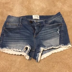 Distressed jean shorts